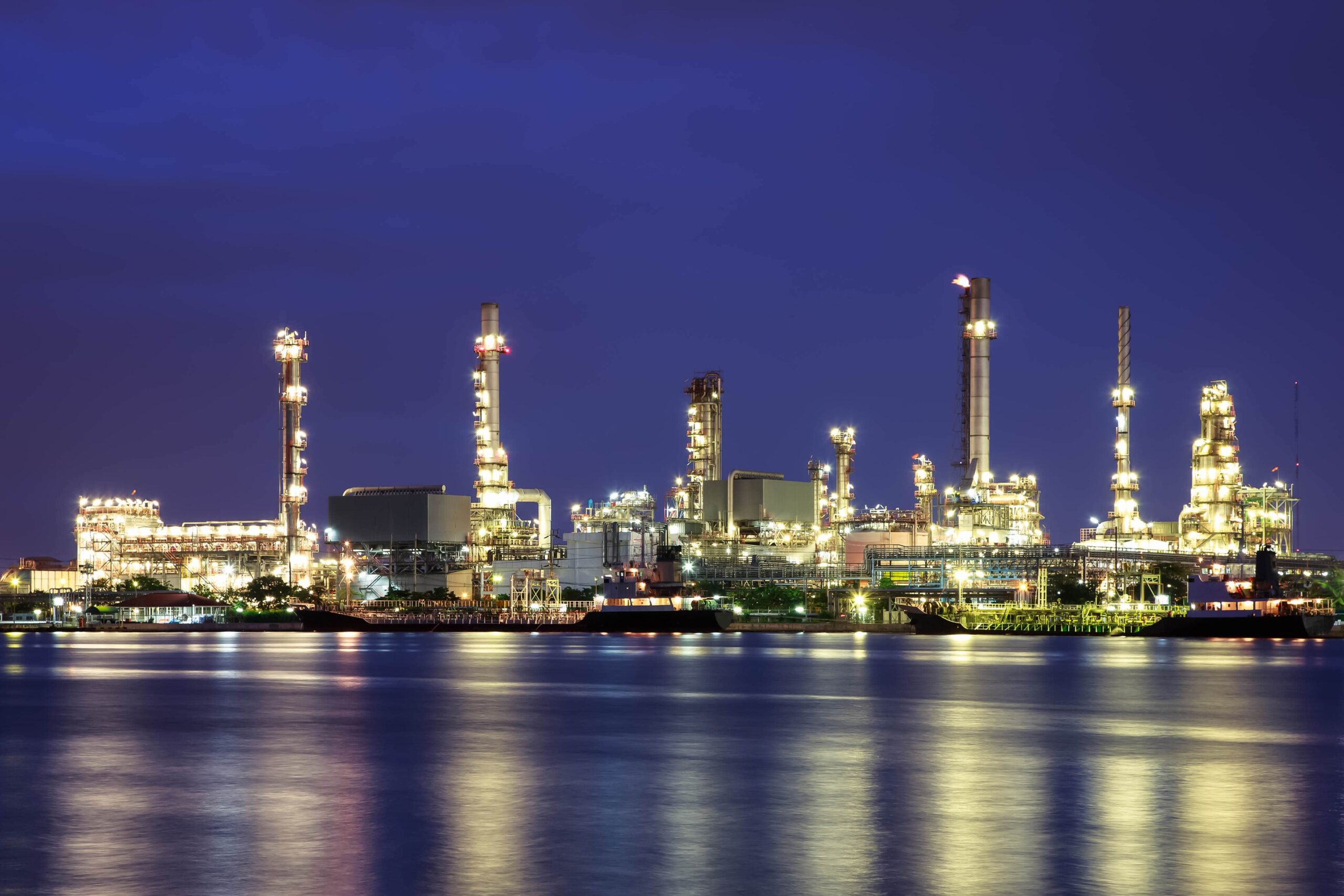 oil-refinery-twilight-with-reflection-min